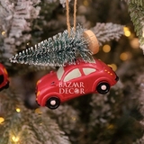 Phụ kiện Xe ô tô đỏ chở cây thông