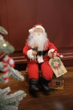 Đồ chơi ông già Noel và chiếc rương đồ chơi có thể cử động