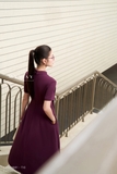 Đầm trên ôm dưới xòe cổ biến kiểu đính khuy trang trí
