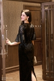 Đầm ôm cổ tròn dài qua bắp