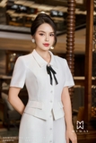 Chân váy xòe đính cúc vạt trước