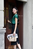 Chân váy ôm dài ngang bắp phối khuy trang trí