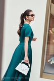 Chân váy xòe dáng xếp ly dài qua bắp