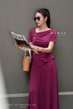 Chân váy xòe rủ dáng dài qua bắp