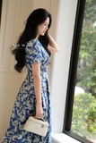 Đầm xòe cổ V tay nắng dài qua bắp