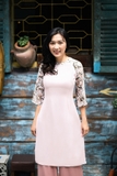 Áo dài cách tân hồng phấn phối tay