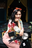 Áo dài cách tân hoa lá màu xanh lơ