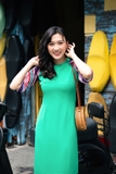 Áo dài cách tân xanh lá phối tay