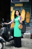 Áo dài cách tân xanh lá phối tay