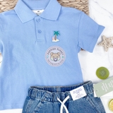 HM Kid Cotton Piqué Polo Shirt Light blue/Palm tree