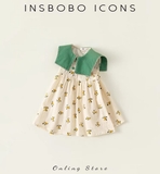 VÁY KID HOA NHÍ CỔ XANH BO DXQ7221