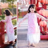 ao-dai-cach-tan-cho-be-gai-kem-vay-2-lop-ren-hinh-chim-en-mamla