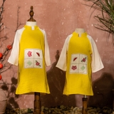 ao-dai-vang-be-trai-be-gai-theu-tet-chat-dui-phoi-lua-van-may-mem-mat-tham-hut-t