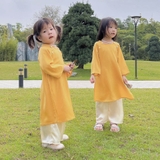 ao-dai-lua-tron-be-gai-kem-quan-tang-day-chuyen-ngoc-chat-lieu-mem-mat-truyen-th