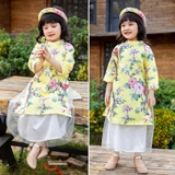 ao-dai-be-gai-set-ao-kem-chan-vay-2-lop-va-man-hoa-hai-duong-mamla