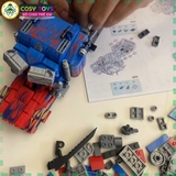 Đồ chơi lắp ghép xếp hình chiến binh Optimus Prime biến hình 2 trong 1 thành xe với 896 chi tiết