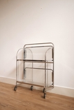 Kệ bánh xe khung inox, kính sọc