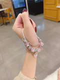 Vòng tay pandora charm hoa hồng