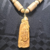 DÂY CHUYỀN TRẦM HƯƠNG TỰ NHIÊN MẶT PHẬT THÍCH CA BỌC VÀNG