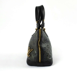 Túi Louis Vuitton dáng hến da dập vân họa tiết monogram màu rêu đậm