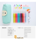 Set of crochet hooks and tools to support turquoise wallets