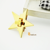 Good quality gold star buckle as a handbag accessory