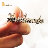 Beautiful handmade metal lettering mark 