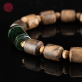 Vòng tay Trầm Hương lu thống 7 li mix charm ngọc ( cho nữ )