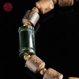 Vòng tay Trầm Hương lu thống 7 li mix charm ngọc ( cho nữ )