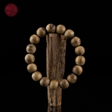 Vòng tay Trầm Hương tròn 12 li rục cận chìm