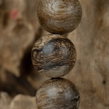 Vòng tay Trầm Hương tròn 14 li cận chìm ( loại 3 )