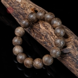 Vòng tay Trầm Hương tròn 14 li cận chìm ( loại 1 )