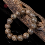 Vòng tay Trầm Hương tròn 14 li cận chìm ( loại 3 )