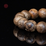 Vòng tay Trầm Hương tròn 14 li cận chìm ( loại 3 )