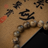 Vòng tay Trầm Hương tròn 12 li cận chìm