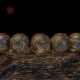 Vòng tay Trầm Hương tròn 14 li cận chìm