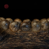 Vòng tay Trầm Hương tròn 12 li cận chìm