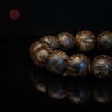 Vòng tay Trầm Hương tròn 16 li cận chìm (tiệm cận chìm )