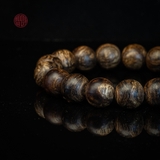 Vòng tay Trầm Hương tròn 12 li cận chìm ( loại 1 )