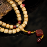 Chuỗi trầm hương Niệm Phật 108 hạt 10 li banh mix đá đỏ