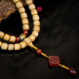 Chuỗi trầm hương Niệm Phật 108 hạt 10 li banh mix đá đỏ