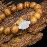 Vòng trầm hương banh già tròn 12 li mix đá trắng