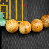 Vòng trầm hương banh già tròn 10 li mix ngọc đài sen