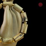 Vòng tay Trầm Hương trúc 12 li banh xanh Malay mix bi vàng 16k