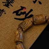 Vòng tay Trầm Hương rục cận chìm dạng trúc tự nhiên ( size trung )