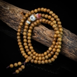 Chuỗi trầm hương 108 hạt 6 li mix charm ngọc ( kiểu 1 )