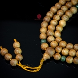 Chuỗi trầm hương 108 hạt 6 li mix charm ngọc ( kiểu 3 )