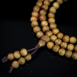 Chuỗi trầm hương 108 hạt 6 li mix charm ngọc ( kiểu 1 )