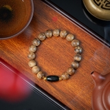 Vòng tay Trầm Hương tròn 10 li cận chìm mix Ngọc Lu Thống