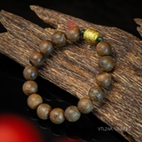 Vòng tay Trầm Hương tròn 12 li cận chìm mix Lu Thống vàng 24k